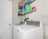 Clothes washing area with washing machine and clothes dryer