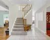 Stairs featuring tile patterned flooring