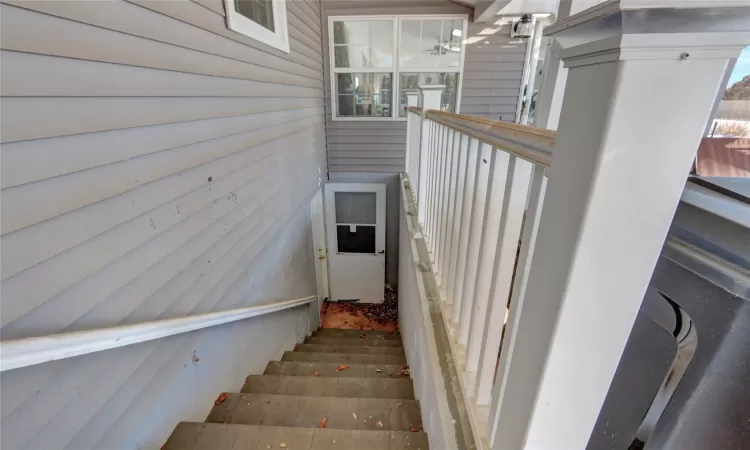 View of outside entrance staircase towards basement .