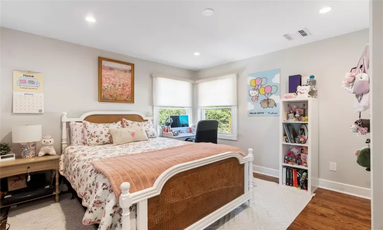 Bedroom featuring hardwood / wood-style floors