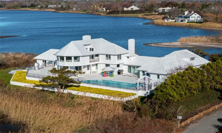 Aerial view featuring a water view