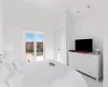 Bedroom featuring lofted ceiling