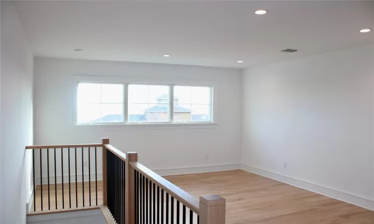 Entrance foyer featuring light hardwood / wood-style flooring