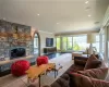 Living room featuring a fireplace and ornamental molding