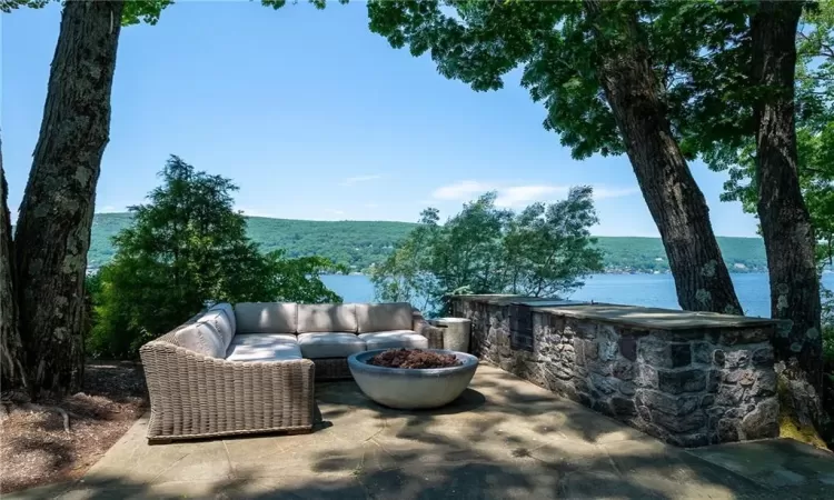 View of patio / terrace featuring a water view