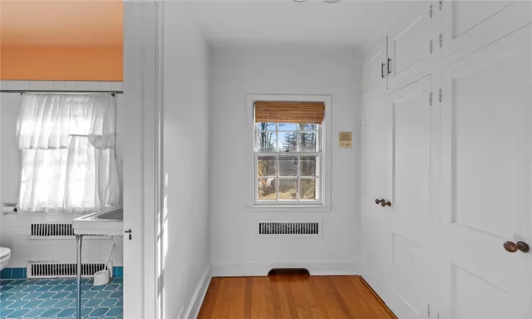 Doorway to outside with hardwood / wood-style flooring