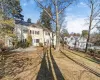 View of front of property with a front lawn