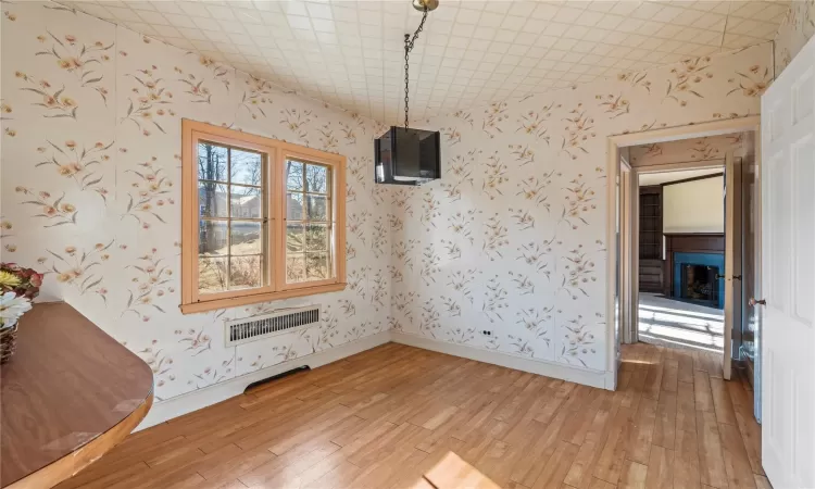 Unfurnished dining area featuring light hardwood / wood-style flooring