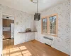 Unfurnished dining area featuring light hardwood / wood-style floors