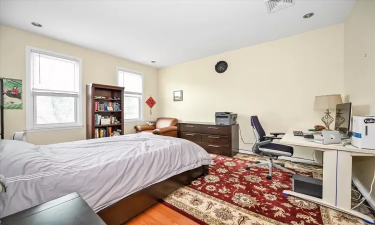 Bedroom featuring light wood-type flooring