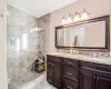 Bathroom with vanity and walk in shower