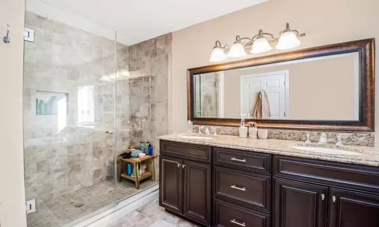 Bathroom with vanity and walk in shower