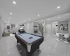 Playroom featuring crown molding and pool table