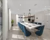 Dining room with a chandelier, a textured ceiling, and ornamental molding (STAGED)