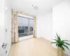 Spare room featuring hardwood / wood-style flooring