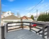 Deck with a garage and an outdoor structure