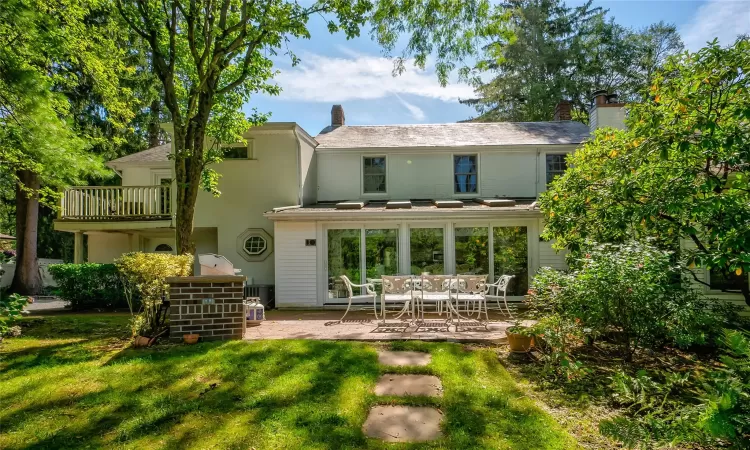 Back of property featuring a patio