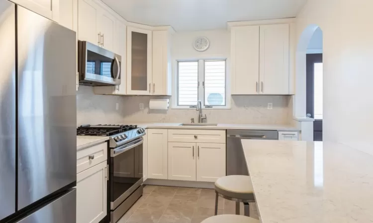 Kitchen with stainless steel appliances