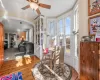 Sitting room featuring ceiling fan and light hardwood / wood-style flooring