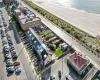 Aerial view with a water view and a view of the beach