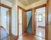 Corridor featuring light wood-type flooring