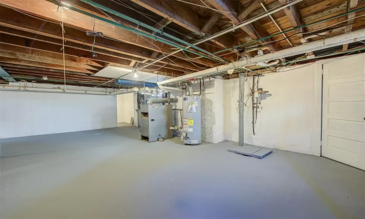 Basement with heating unit and gas water heater