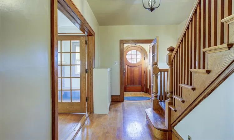 Foyer with a healthy amount of sunlight and light wood-type flooring