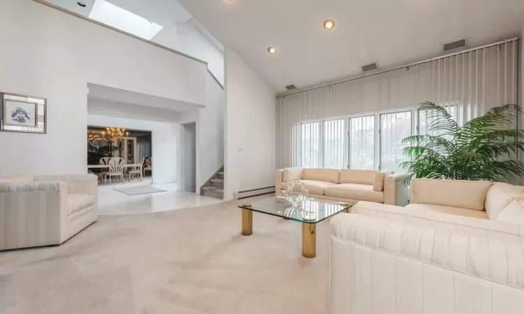 Harwood Floors Under all Carpeting, and skylights