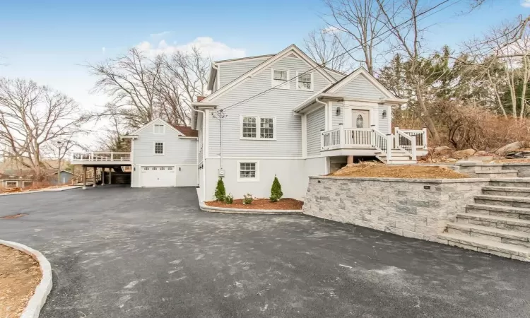 View of front of property featuring a garage