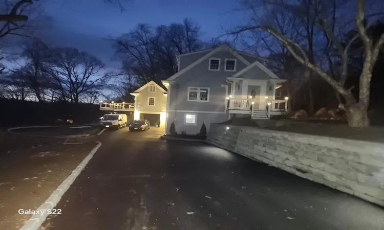 View of front of property with a garage