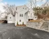 View of front of home featuring a garage