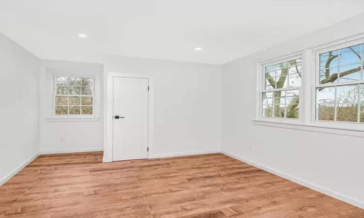 Spare room with light hardwood / wood-style flooring