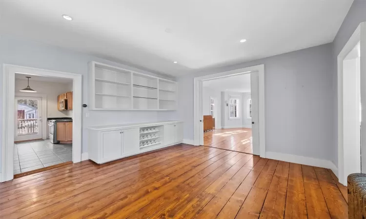 Unfurnished living room with light wood-type flooring