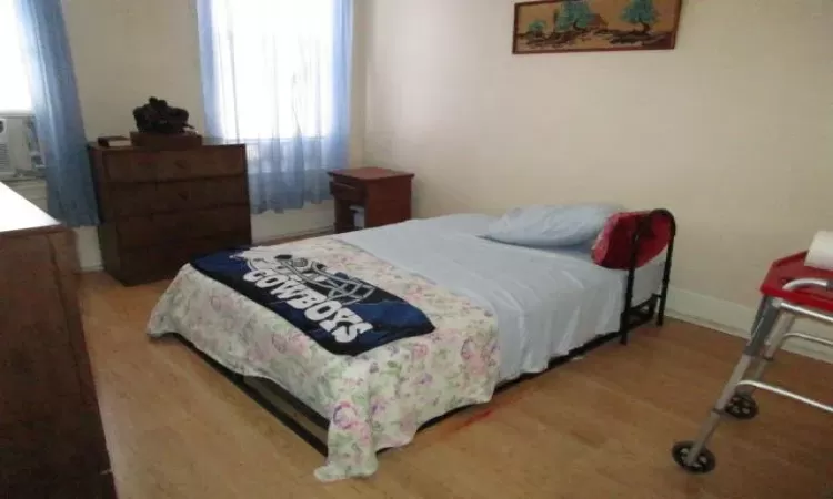 Bedroom featuring light hardwood / wood-style floors