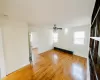 Unfurnished room featuring ceiling fan and light hardwood / wood-style flooring