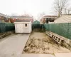 View of yard featuring a patio and a storage shed