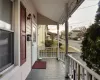 Balcony featuring a porch