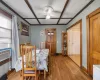 Dining area featuring coffered ceiling, ceiling fan, light wood-type flooring, and a wealth of natural light