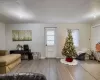 Living room with light wood-type flooring