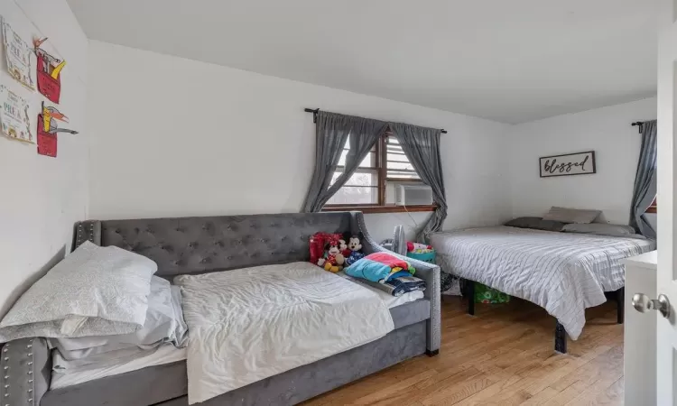 Bedroom with light wood-type flooring