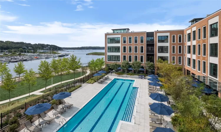 View of swimming pool featuring a water view