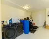 Laundry area featuring independent washer and dryer