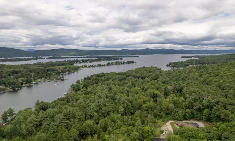 Bird's eye view featuring a water and mountain view