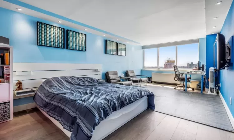 Bedroom featuring hardwood / wood-style floors