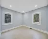 Unfurnished room with light hardwood / wood-style floors