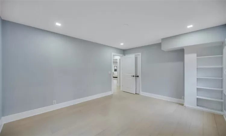 Empty room featuring light hardwood / wood-style flooring