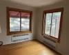 Spare room featuring light hardwood / wood-style floors and radiator