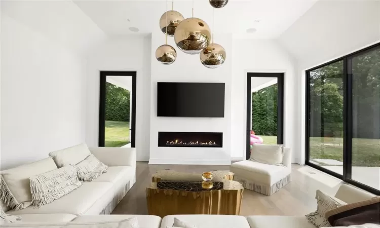 family room  featuring lofted ceiling and gas fireplace