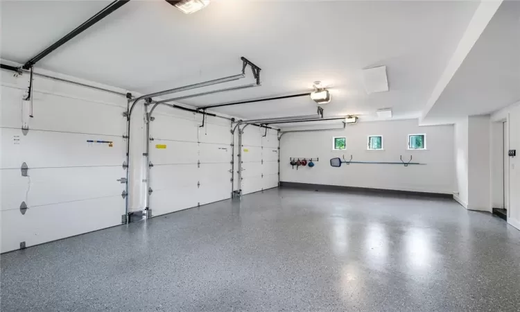 3 car garage with epoxy flooring