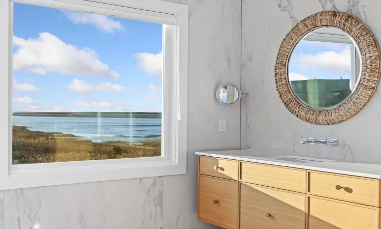 Bathroom with a water view and vanity